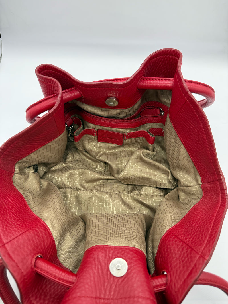COLE HAAN Red handbags