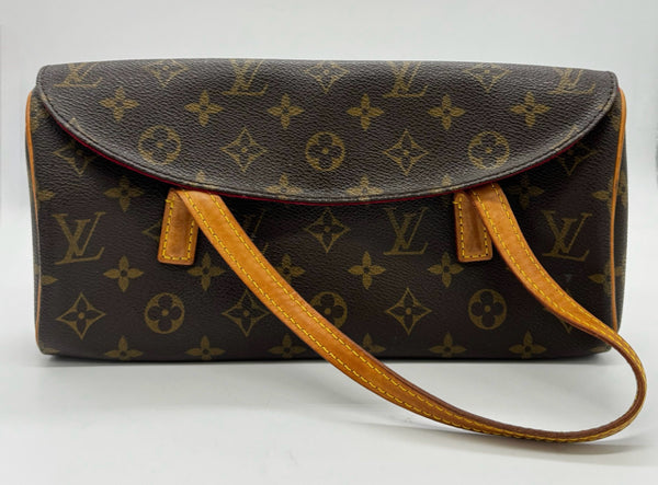 LOUIS VUITTON Brown handbags