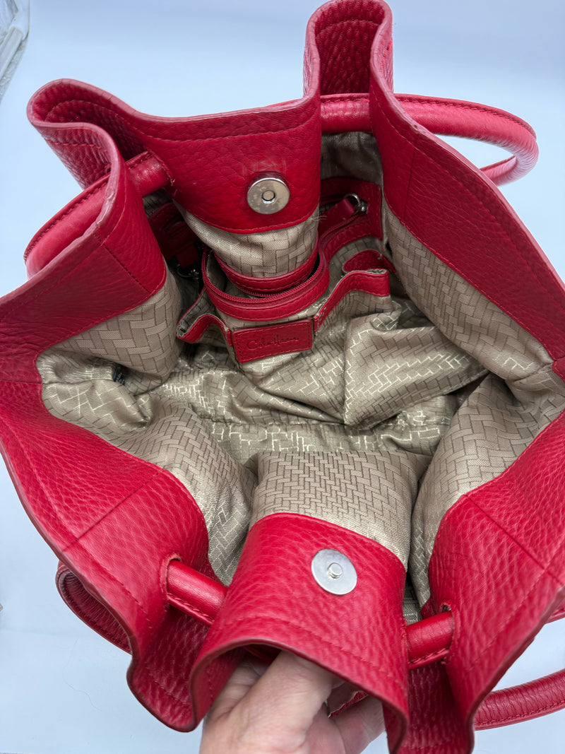COLE HAAN Red handbags