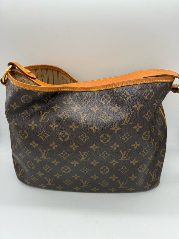 LOUIS VUITTON Brown handbags