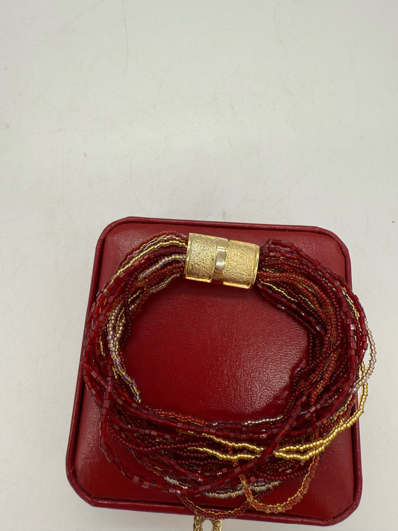 red and gold bracelet