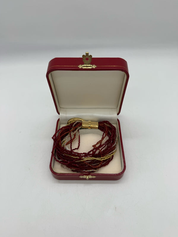red and gold bracelet