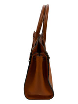 Dooney & Bourke orange and brown Handbag