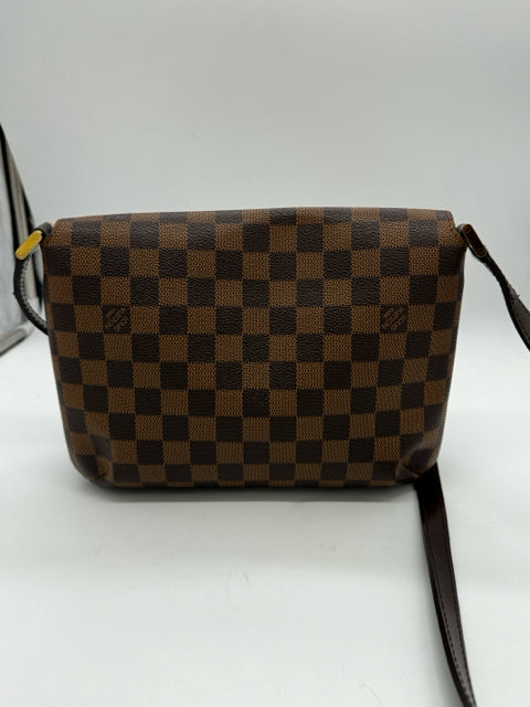 LOUIS VUITTON Brown handbags