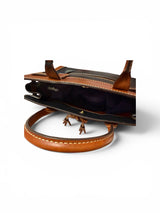 dooney and bourke black and tan Handbag