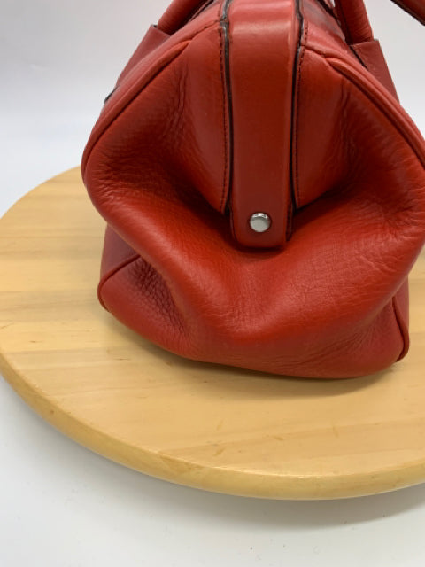 PRADA Red handbags